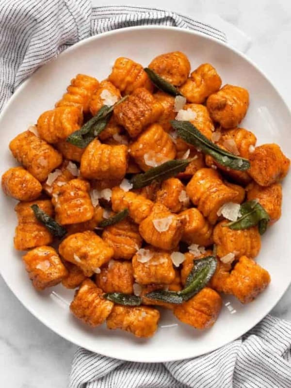 Sweet potato gnocchi on a plate.