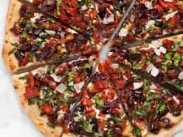 Fire Roasted Tomato Pizza With Kalamata Olives Spinach