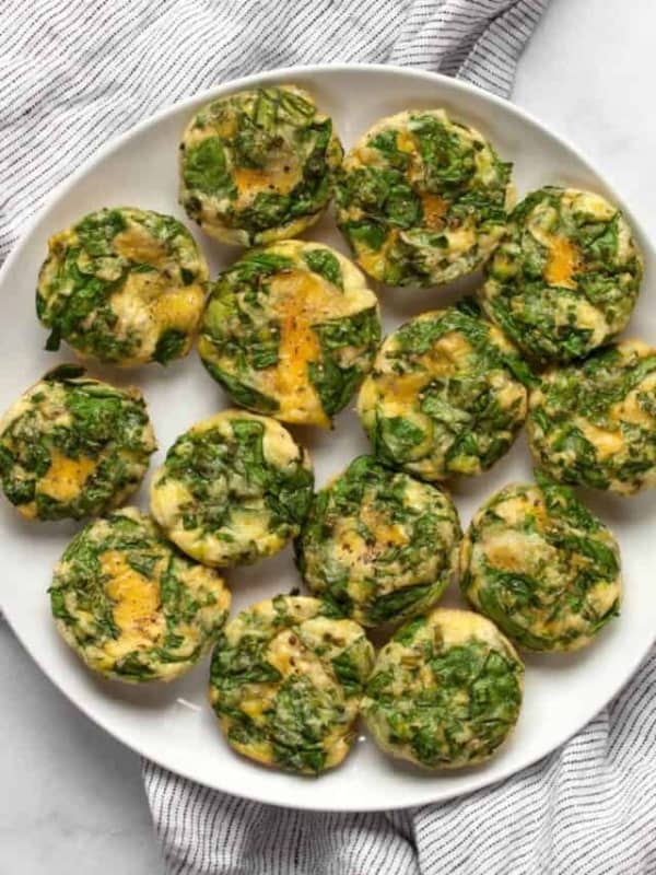 Small baked frittatas on a plate.