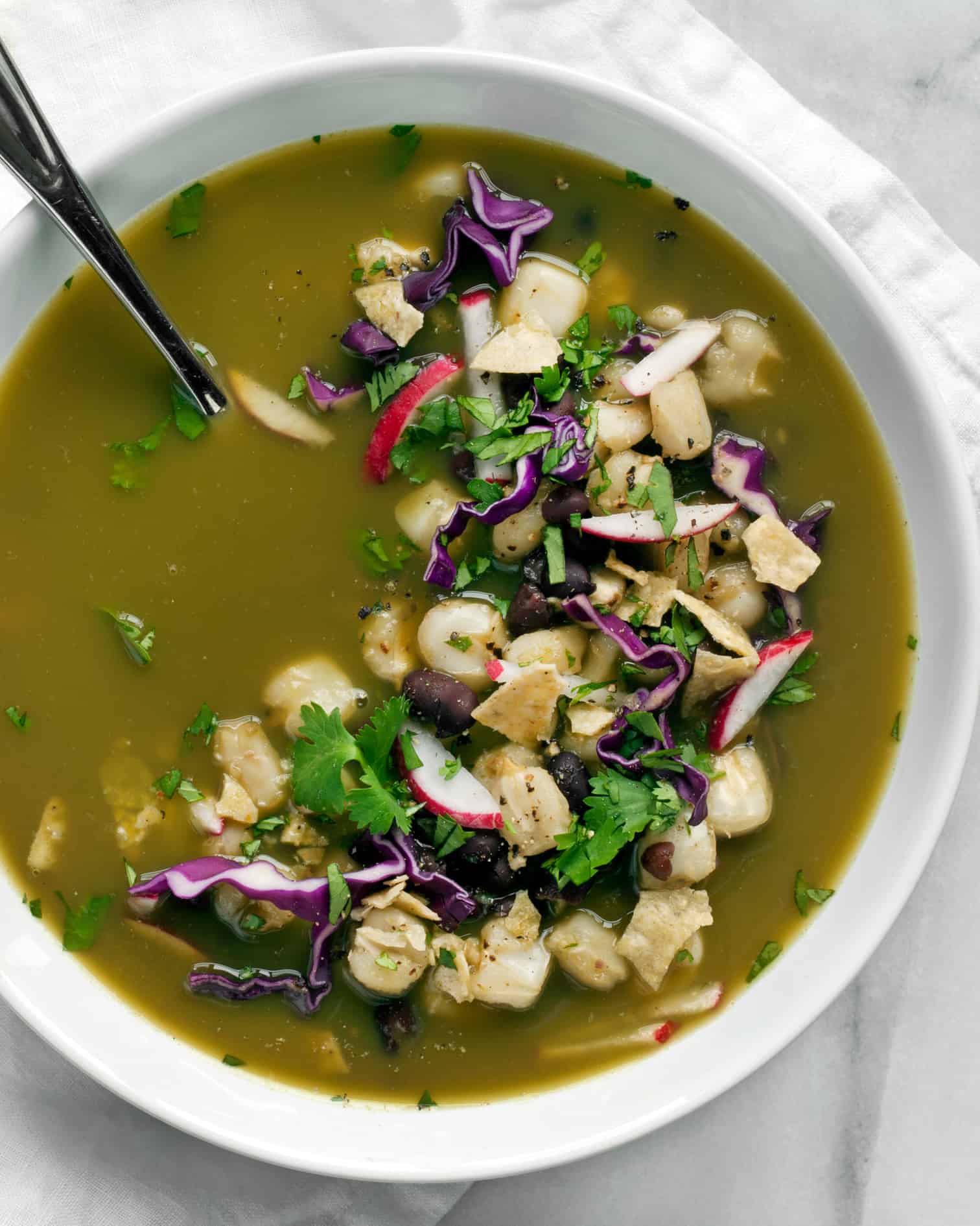 green-chili-posole-last-ingredient