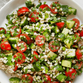 Tabbouleh salad with pearl barley on a plate.