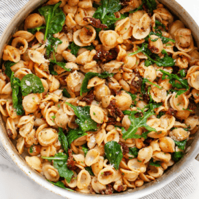 Lemony white bean pasta in a skillet.