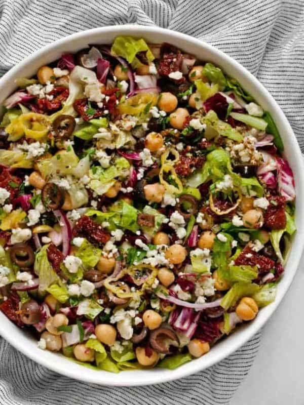 A large serving bowl with an Italian chopped salad.