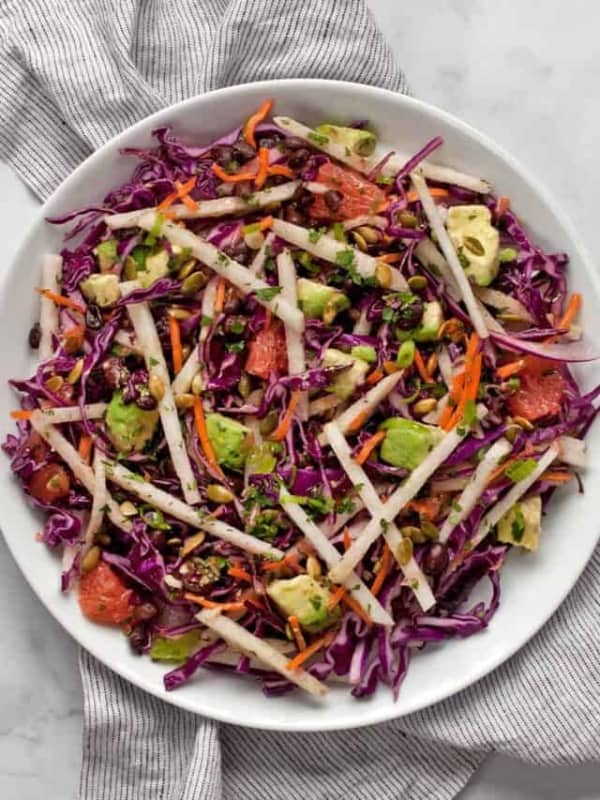 Jicama cabbage salad on a plate.