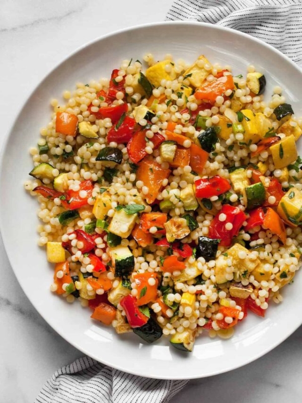 Roasted vegetable couscous on a plate.