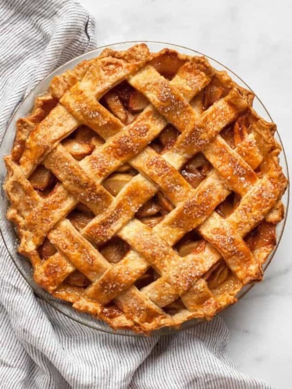 Salted caramel apple pie in a dish.