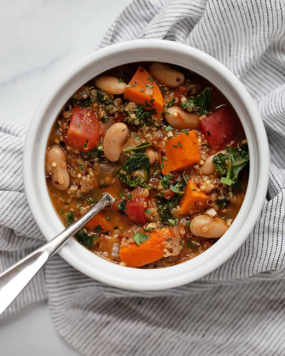 Bowl of quinoa vegetable soup.