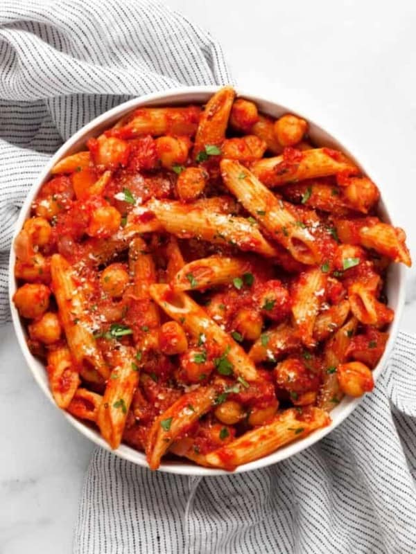 Penne arrabbiata in a small bowl.