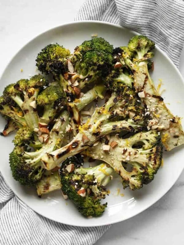 Lemon grilled broccoli on a plate.