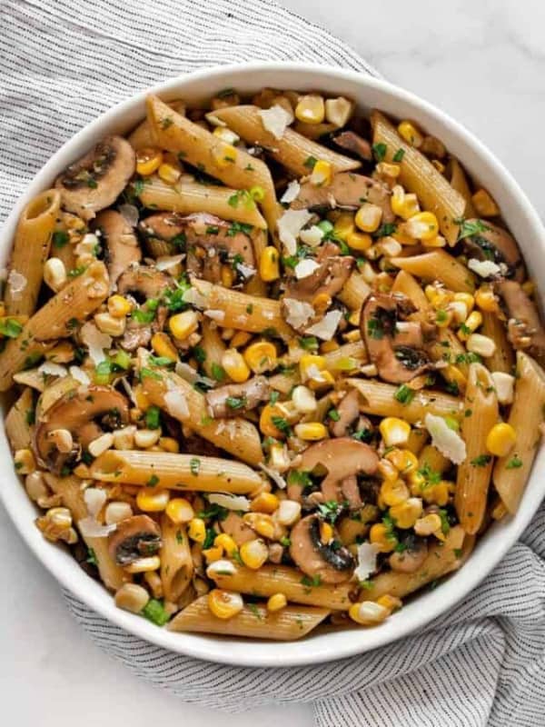 Mushroom corn penne in a bowl.