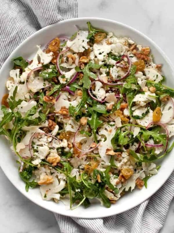 Raw cauliflower salad on a plate.