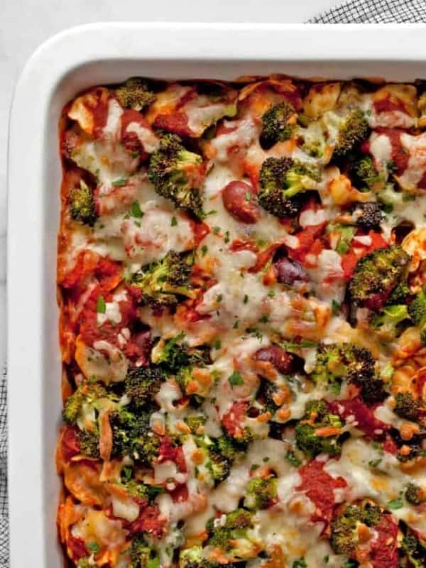 Pasta bake with cheese tortellini in a casserole dish.