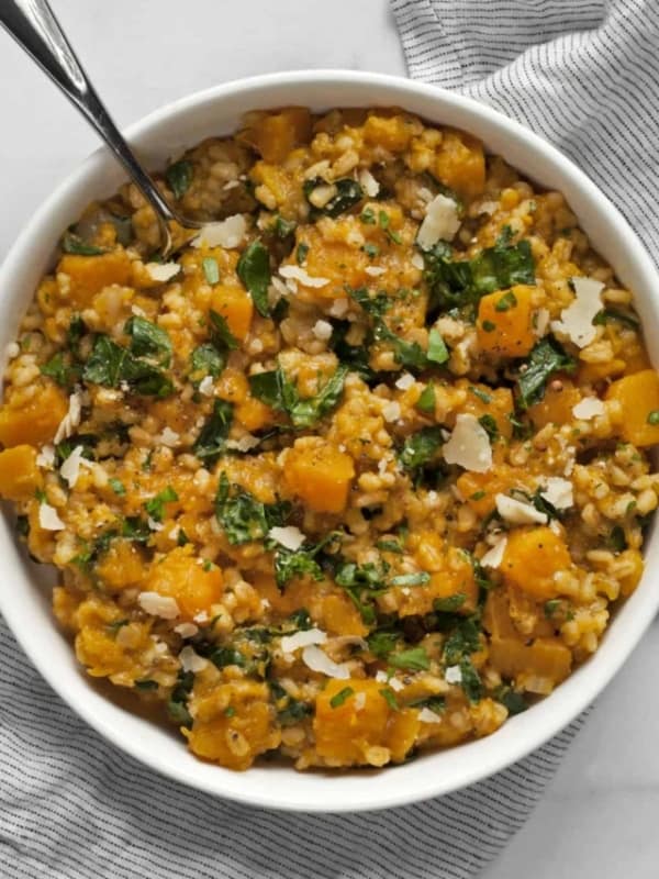 Baked squash risotto in a bowl.