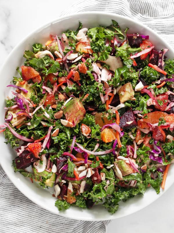 Roasted beet and orange salad on a large plate.