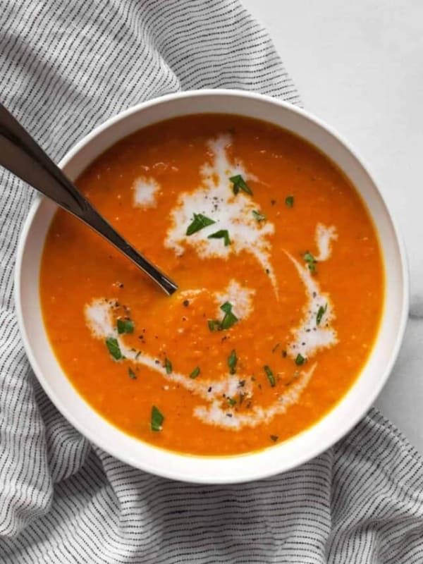 Vegan carrot ginger soup in a bowl.