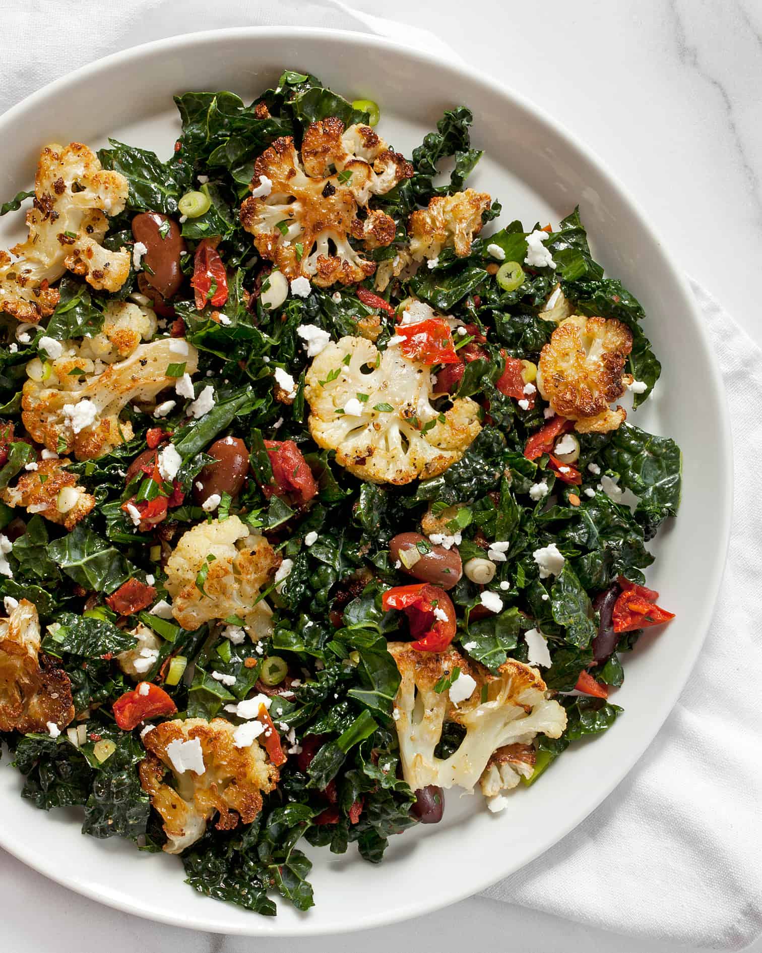 Roasted Cauliflower Kale Salad with Olives & Tomatoes Last Ingredient