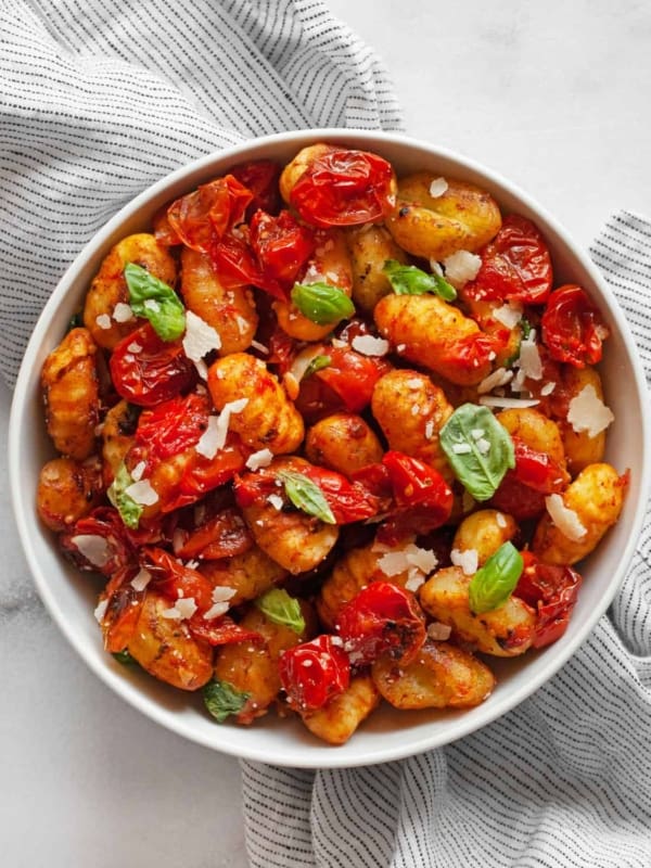 Cherry tomato sheet pan gnocchi in a bowl.