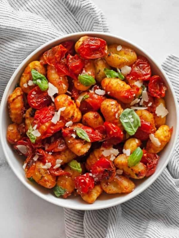 Cherry tomato sheet pan gnocchi in a bowl.