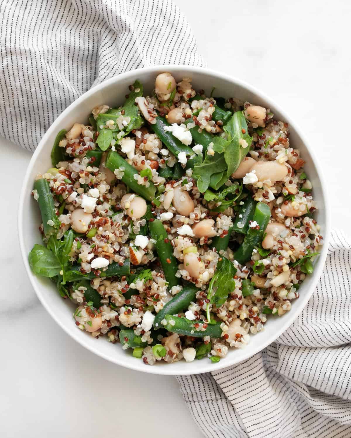 Green bean quinoa in a small bowl.