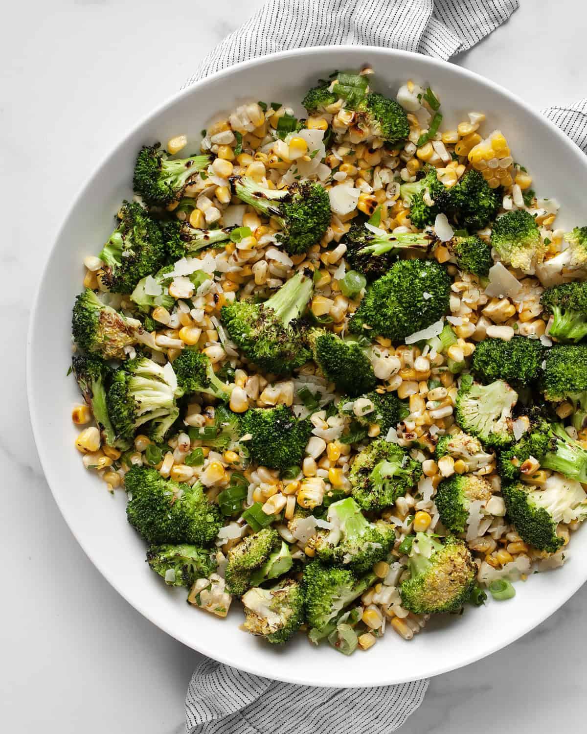 Grilled corn broccoli salad in a bowl.