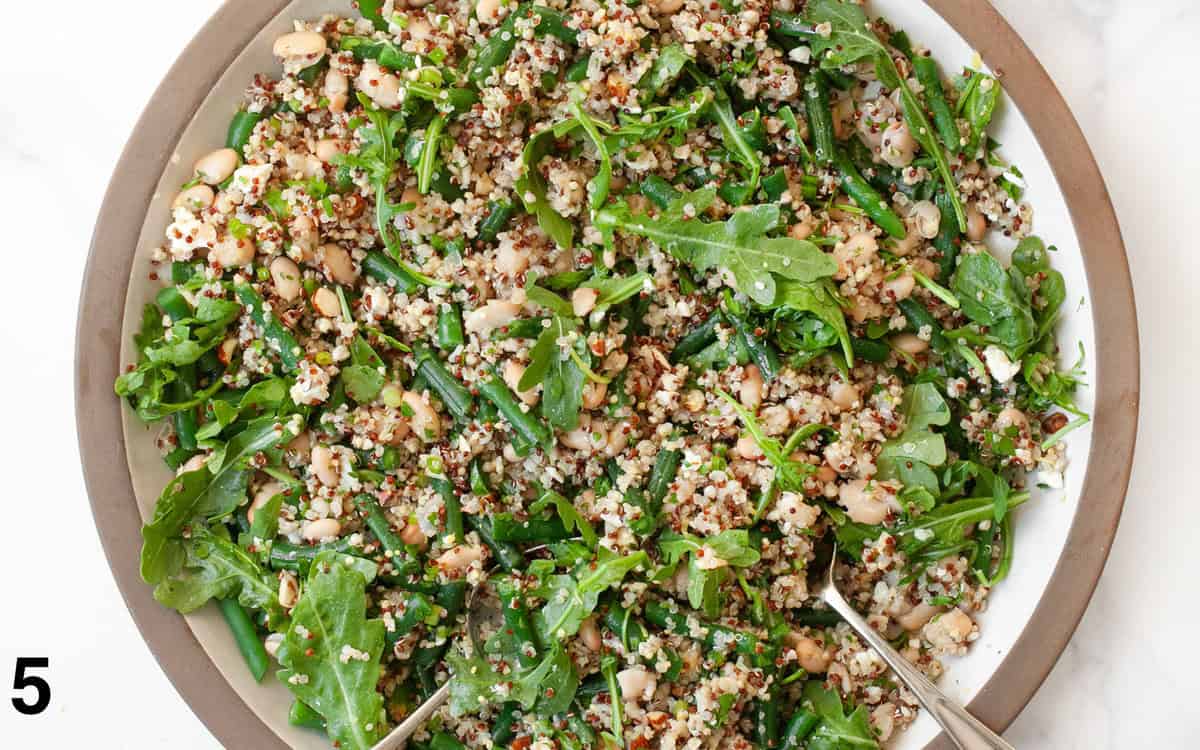 Quinoa tossed together with the dressing.