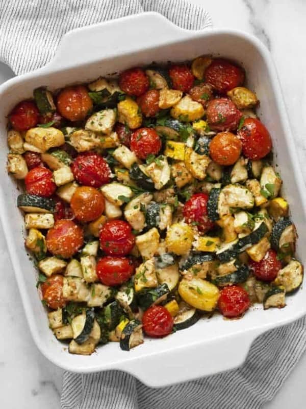 Balsamic zucchini tomato casserole in a square dish.