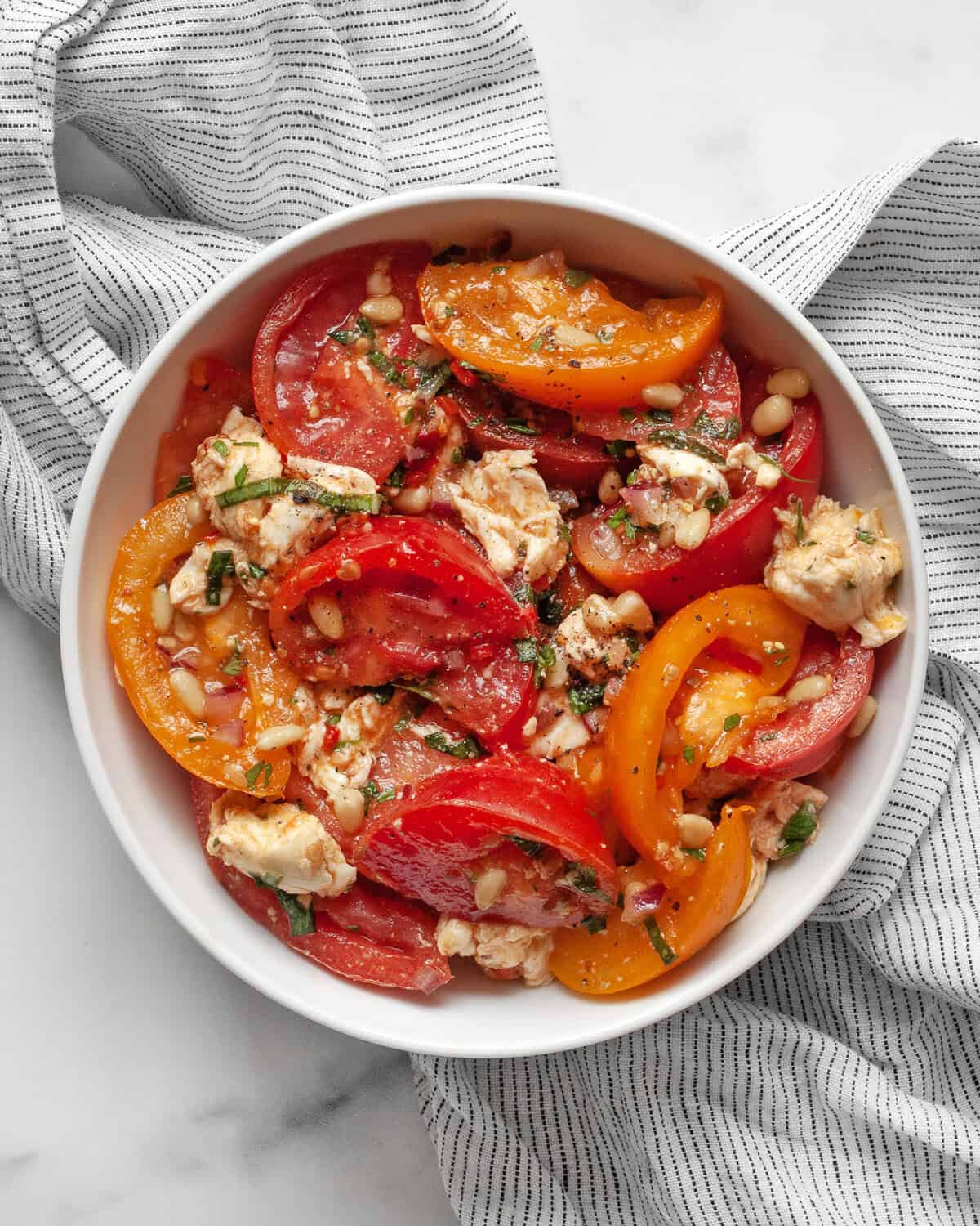 Tomato mozzarella salad in a bowl.