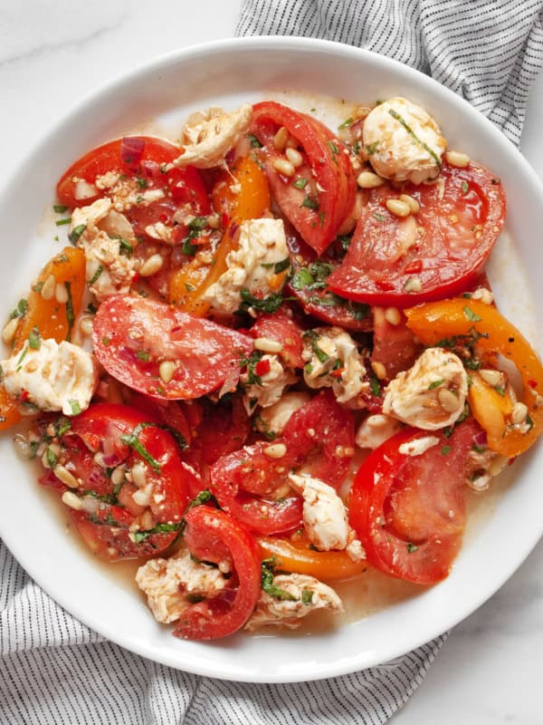 Tomato mozzarella salad on a plate.