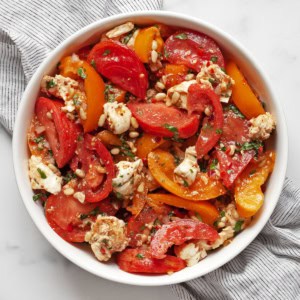 Heirloom tomato salad in a large bowl.