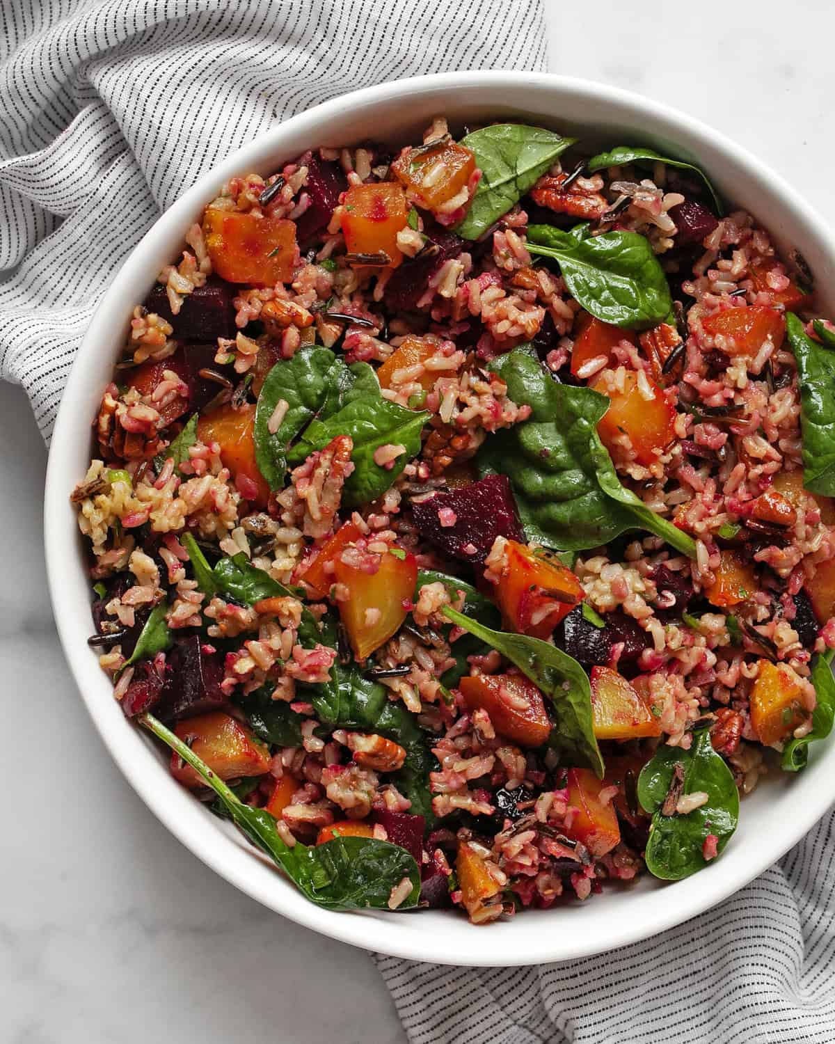 Roasted beet wild rice pilaf in a bowl.