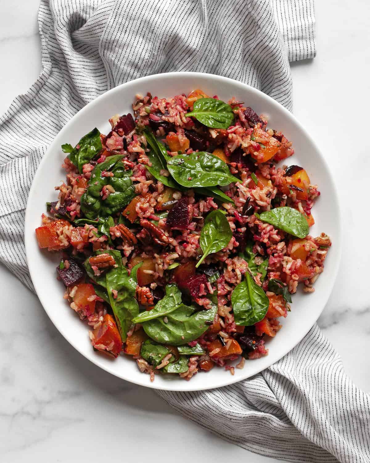 Roasted beet wild rice pilaf on a plate.