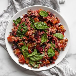 Roasted beet wild rice pilaf on a plate.