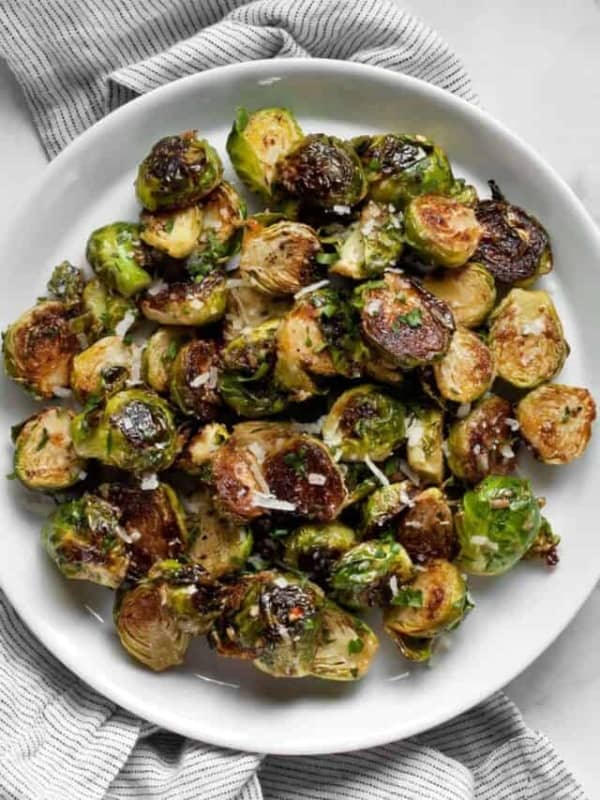 Sauteed brussels sprouts on a plate.