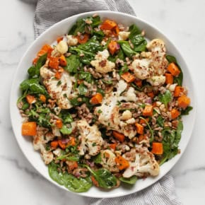 Sweet potato cauliflower salad on a plate.