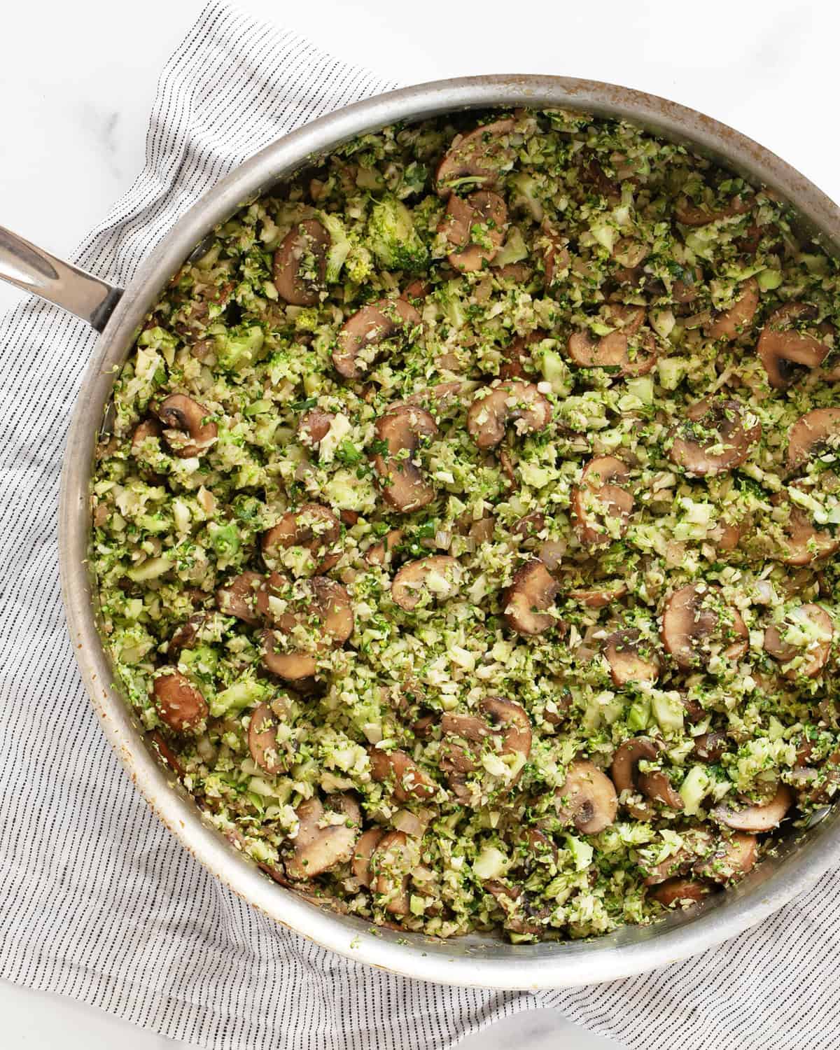 Balsamic mushroom broccoli rice in a skillet.