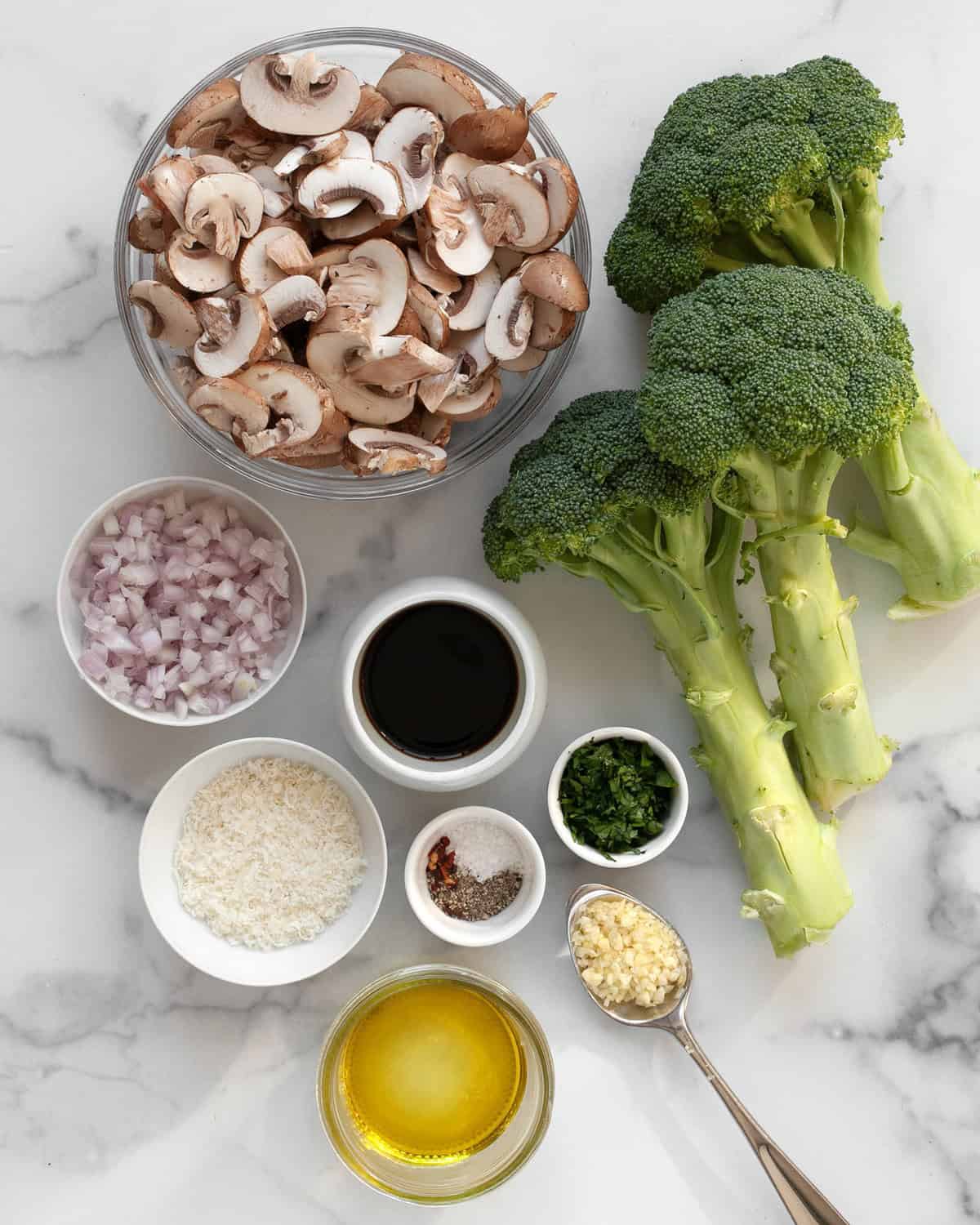 ingredients including broccoli, mushrooms, balsamic vinegar, olive oil, parmesan, red pepper flakes, salt, pepper, parsley, shallots and garlic.