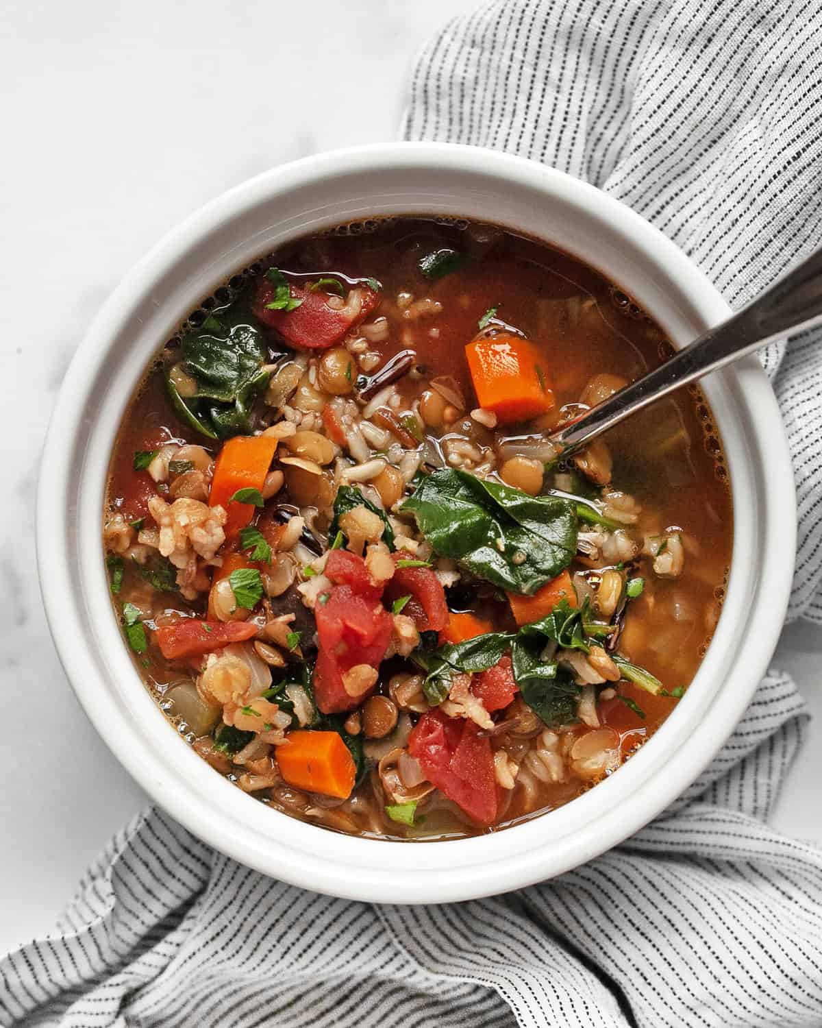 Bowl of lentil wild rice soup.