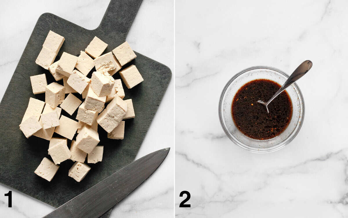 Cubed tofu on a cutting board. Sauce mixed in a small bowl.