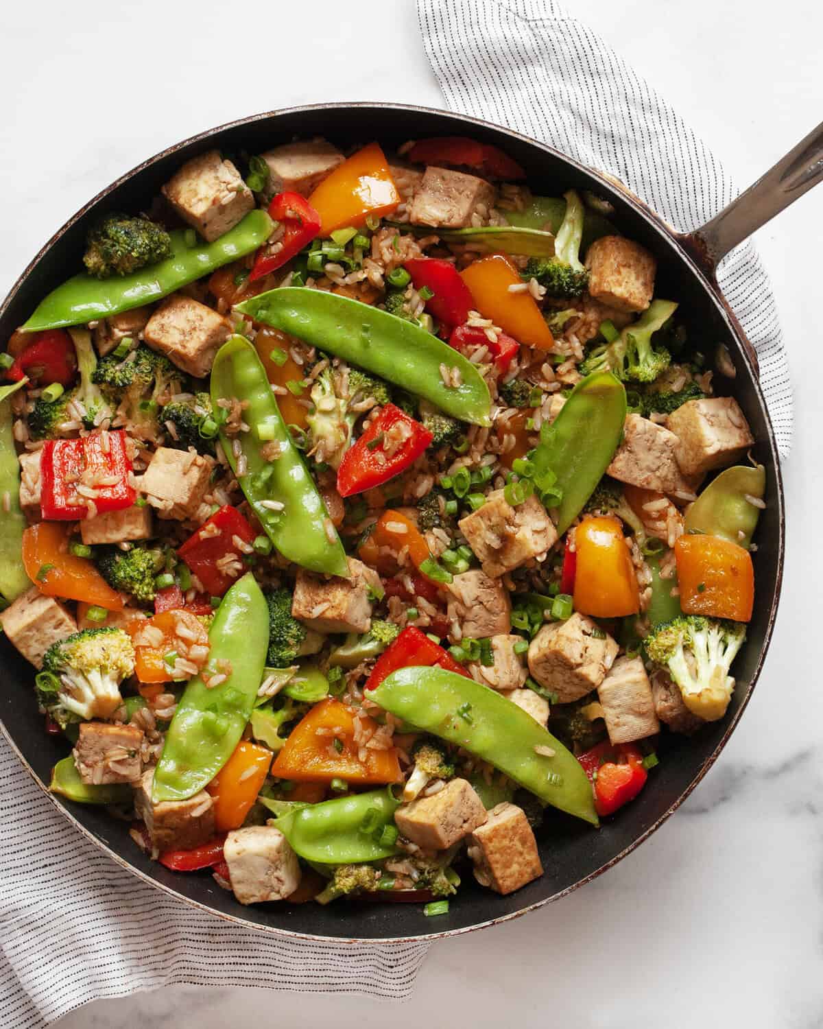 Vegetable tofu stir-fry in a skillet.