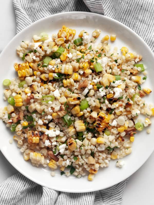 Grilled corn couscous on a plate.