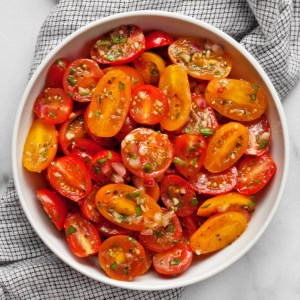 Marinated tomatoes in a bowl.