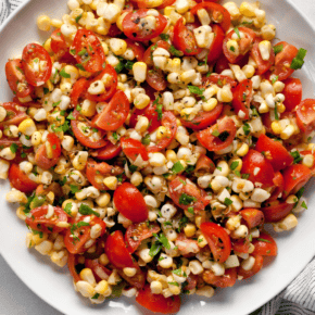 Marinated corn tomato salad on a plate.