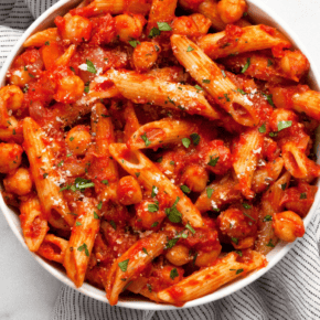 Penne arrabbiata with chickpeas in a bowl.