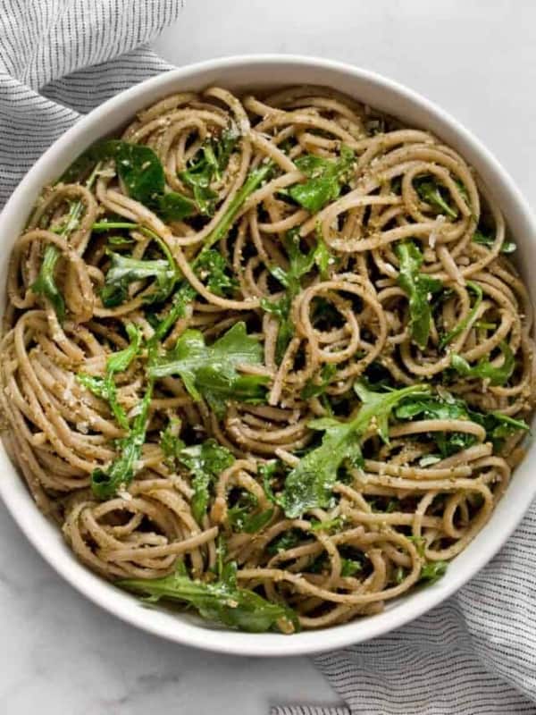 Arugula pasta in a large bowl.