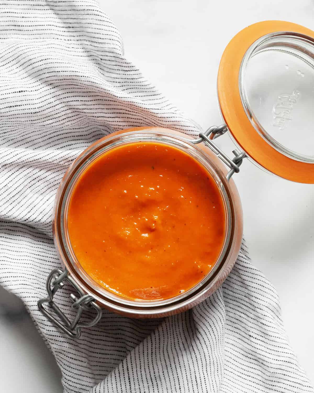 Roasted cherry tomato sauce in a jar.