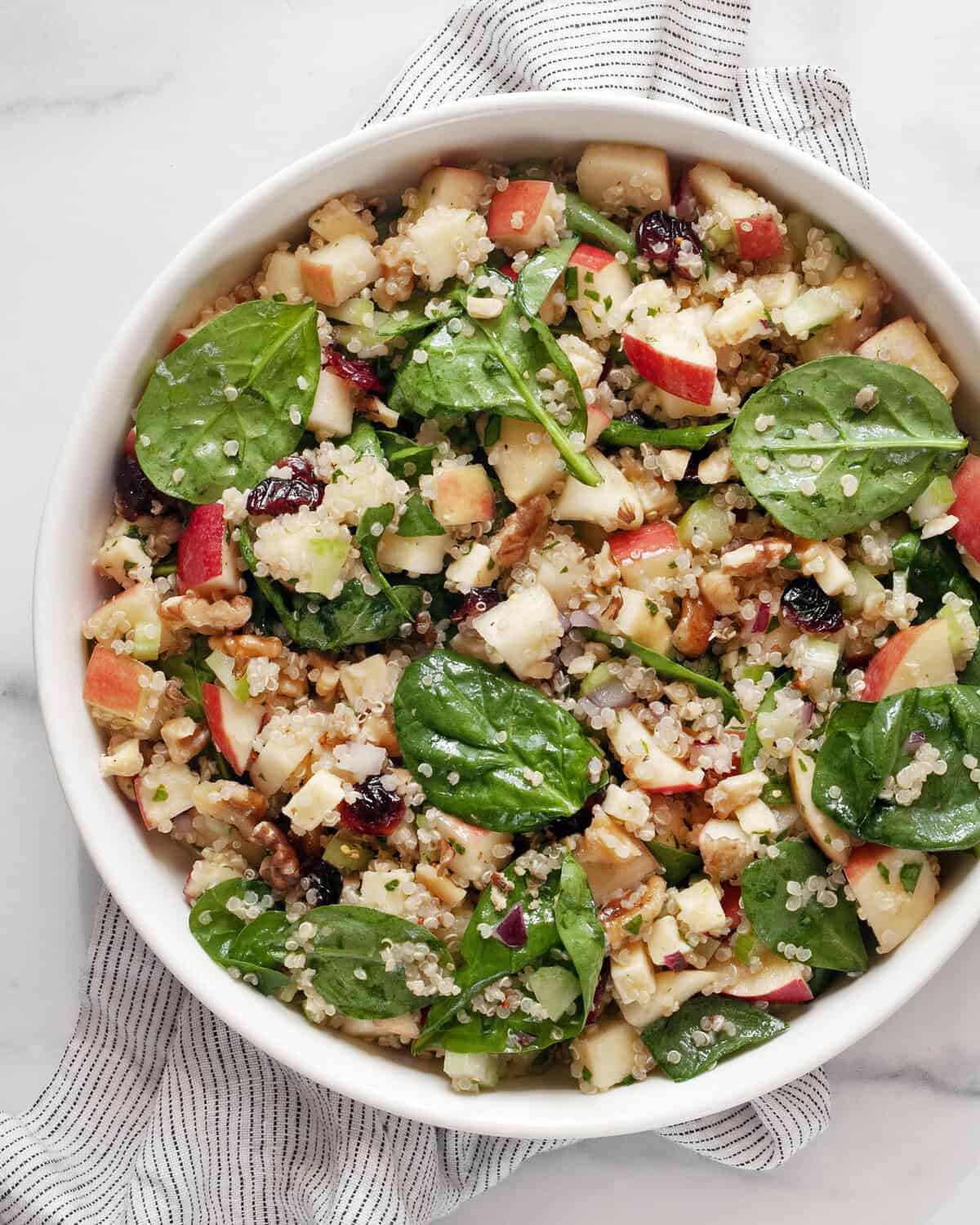 Quinoa apple salad in a bowl.