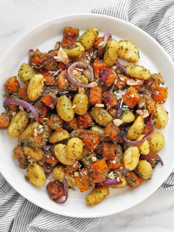 Roasted butternut squash sheet pan gnocchi in a plate.