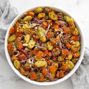 Roasted butternut squash sheet pan gnocchi in a bowl.