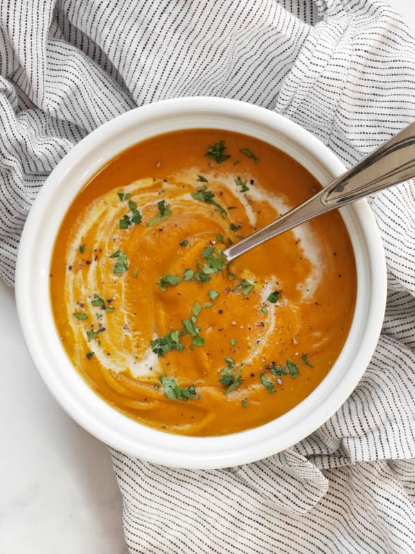 Bowl of creamy roasted kabocha squash soup.