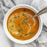 Bowl of vegan roasted kabocha squash soup.